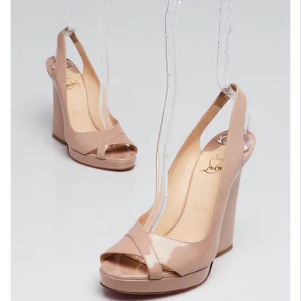 Elegant Christian Louboutin Nude Wedge.